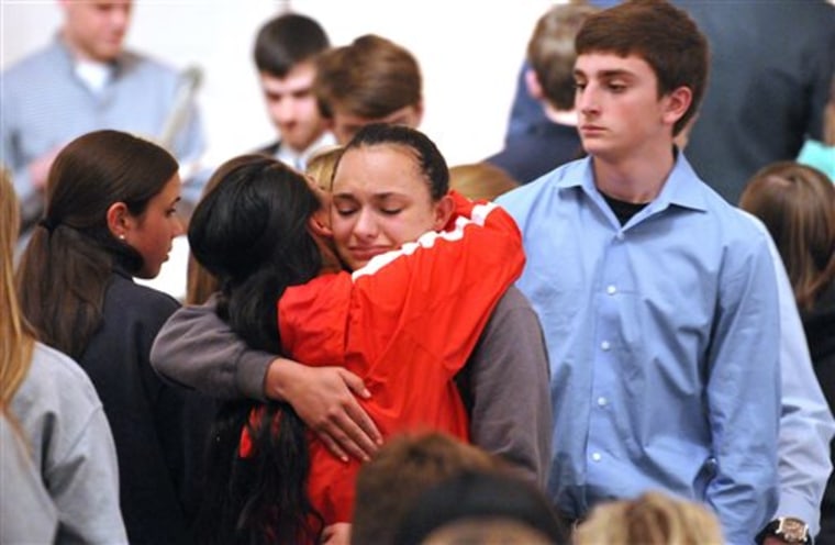 Friends and family including many students from Jonathan Law High School attend a memorial service at the First United Church of Christ in Milford Con...