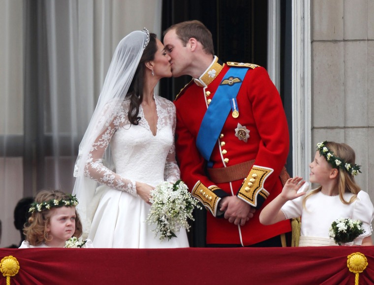 LONDON, ENGLAND - APRIL 29:  Their Royal Highnesses Prince William, Duke of Cambridge and Catherine, Duchess of Cambridge kiss on the balcony at Bucki...