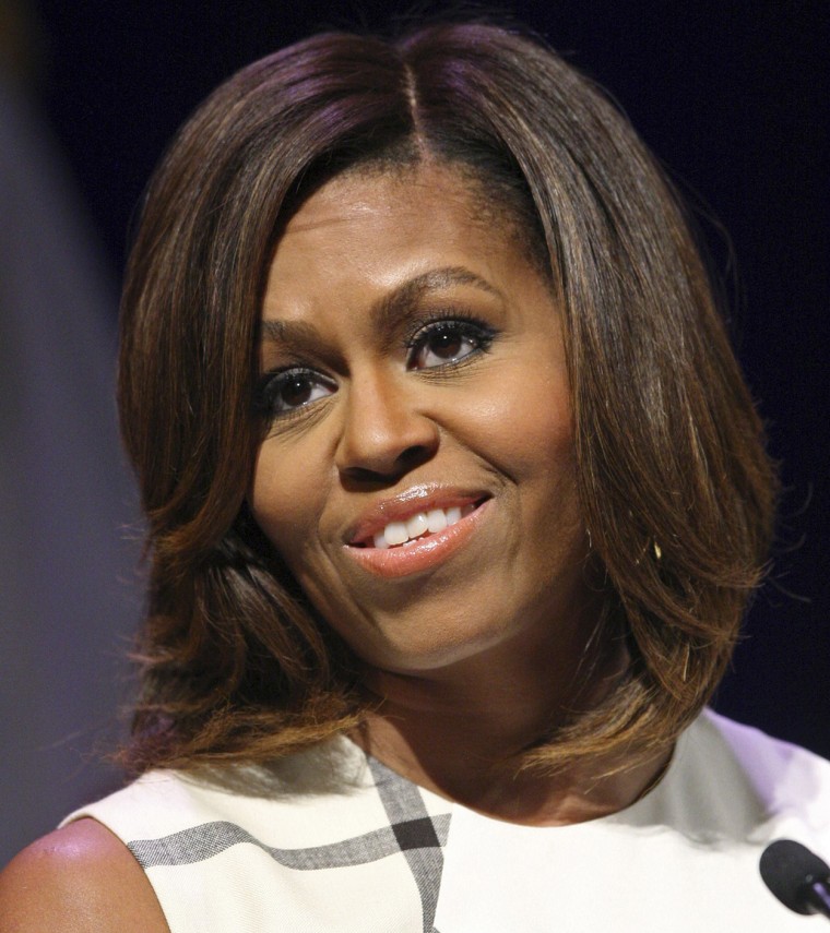 U.S. first lady Michelle Obama gives a keynote speech to the Unite For Veterans Summit in Los Angeles, California, July 16, 2014. Obama is on a two-da...