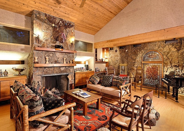 John Denver's former estate in Aspen has four fireplaces indoors and one outdoors.