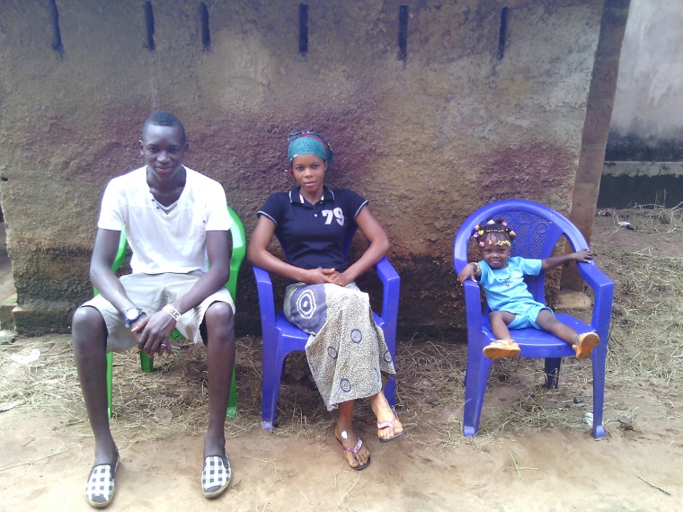 Sara Laskowski had to tell her host family in Guinea (L to R: Ibro, Djenab, Bountourabi) that she would leave while they must stay.