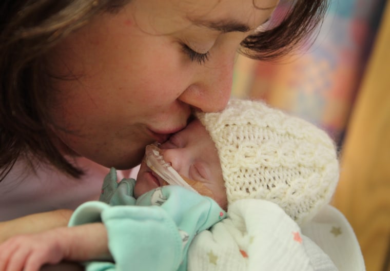Heidi Van Kirk with baby Alexandra, known as Sasha