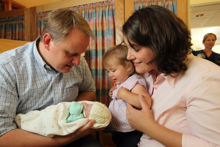 Matthew and Heidi Van Kirk with baby Alexandra (Sasha) and daughter Josephine