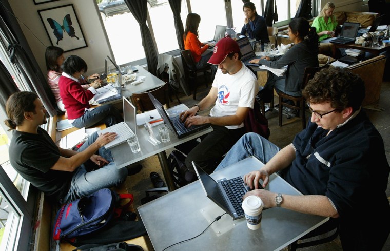 Customers at the Canvas Cafe in San Francisco take advantage of free wi-fi.