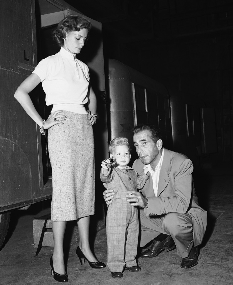 Stephen Bogart, not yet two years old, learns about movie making from his dad, actor Humphrey Bogart, during a surprise visit to the set of &quot;Siro...