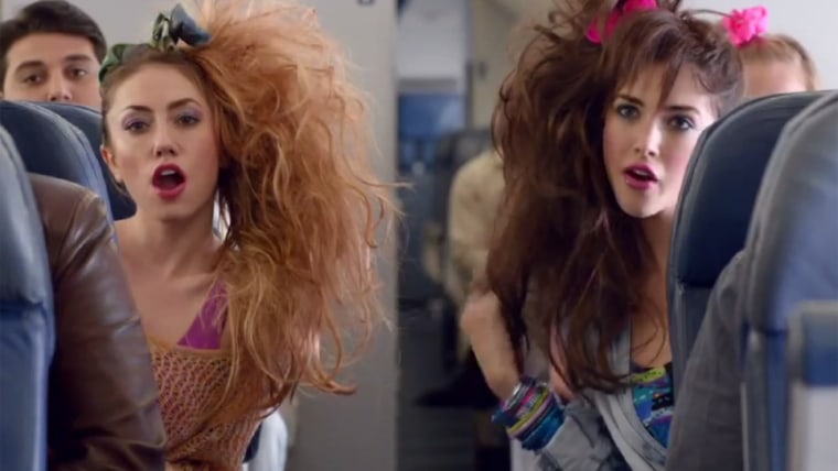 Delta Airlines' new safety video does the time warp back to the decade of Valley Girls, mall hair and Madonna wannabes.