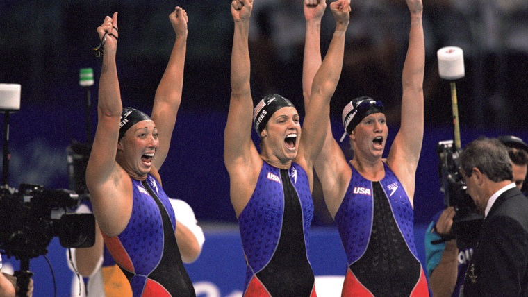 16 Sep 2000:  Amy Van Dyken, Dara Torres and Courtney Shealy of the United States exhalt after the Women's 4x100 Meter Relay final at the Sydney Inter...