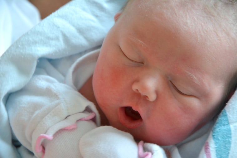 True beauty: When you're holding a precious newborn like Vale, who cares if mom is wearing make-up?