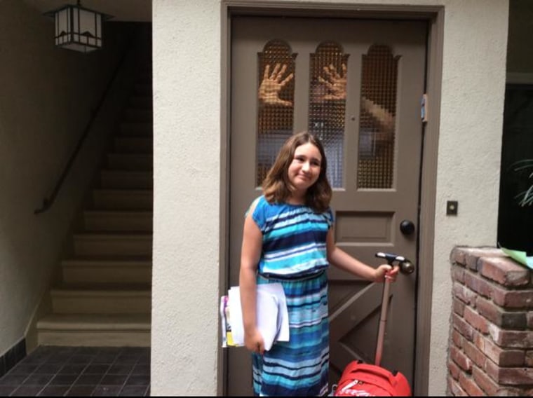 The best ever photo bomb by Dad as his 5th grader is ready for school.