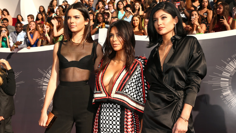 INGLEWOOD, CA - AUGUST 24:  (L-R) TV personalities Kendall Jenner,  Kim Kardashian and Kylie Jenner attend the 2014 MTV Video Music Awards at The Foru...