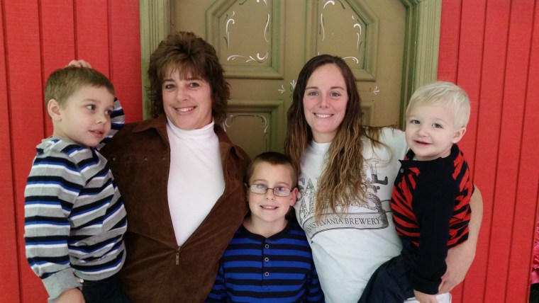 Katherine Deprill, second from right, says reuniting with her biological mother Cathy Pochek, second from left, has been \"awesome.\" Deprill's children...