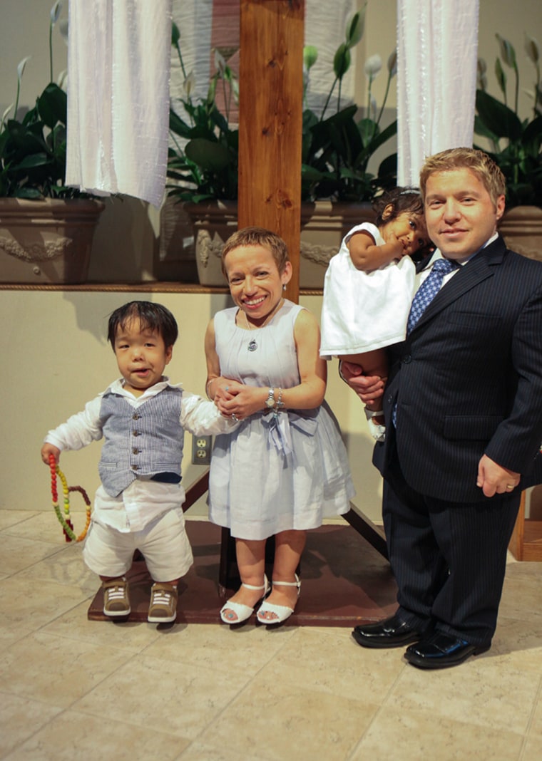 Arnold and Klein celebrate their children's baptisms.