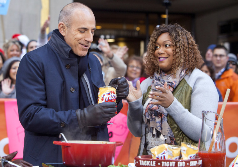 TODAY Show: Sunny Anderson cooks up nacho dogs, root beer chicken and more as she tailgates on the plaza on December 4, 2014.