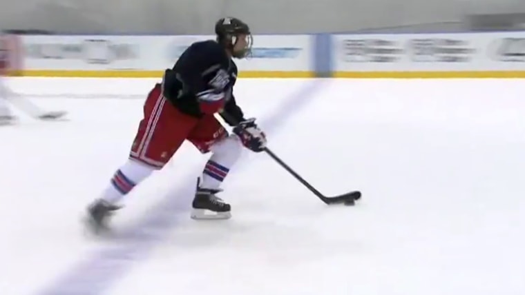 15-year-old Chris Falzone warming up with the New York Rangers.