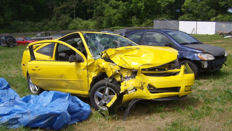 The car Christine Cascaddan’s daughter was in. The toddler was sitting in a forward facing car seat and broke her neck .