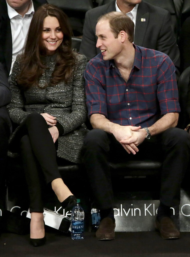 epa04520975 Britain's Prince William (R), Duke of Cambridge, and Catherine (L), Duchess of Cambridge, watch the Cleveland Cavaliers against the Brookl...