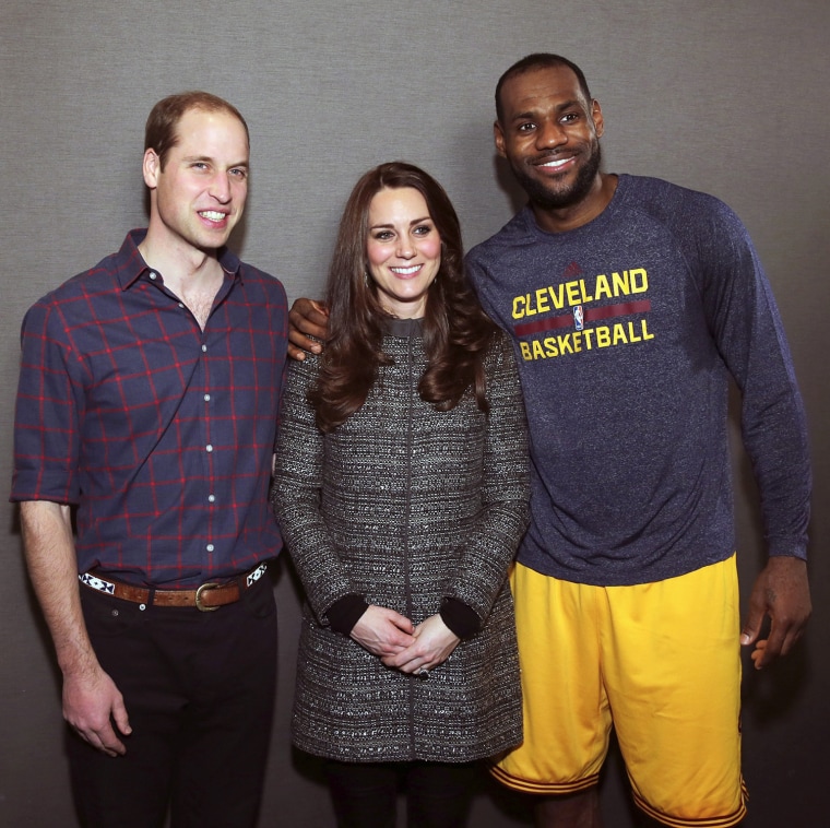 epa04520898 Prince William, Duke of Cambridge (L) and Catherine, Duchess of Cambridge pose with LeBron James (R) backstage as they attend the Clevelan...