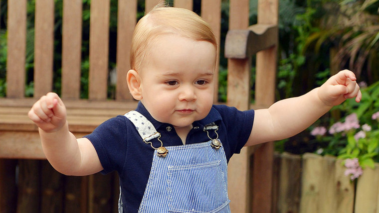 Prince George's chubby little fingers love playing with an iPad.