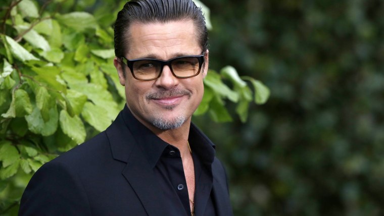 Actors Brad Pitt  arrives for a special Maleficent Costume Display at Kensington Palace in London May 8, 2014.