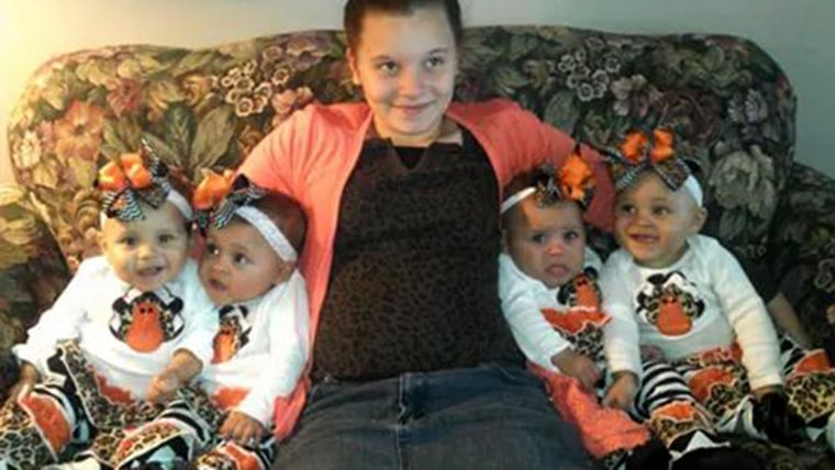 Katelyn surrounded by the babies on Thanksgiving.