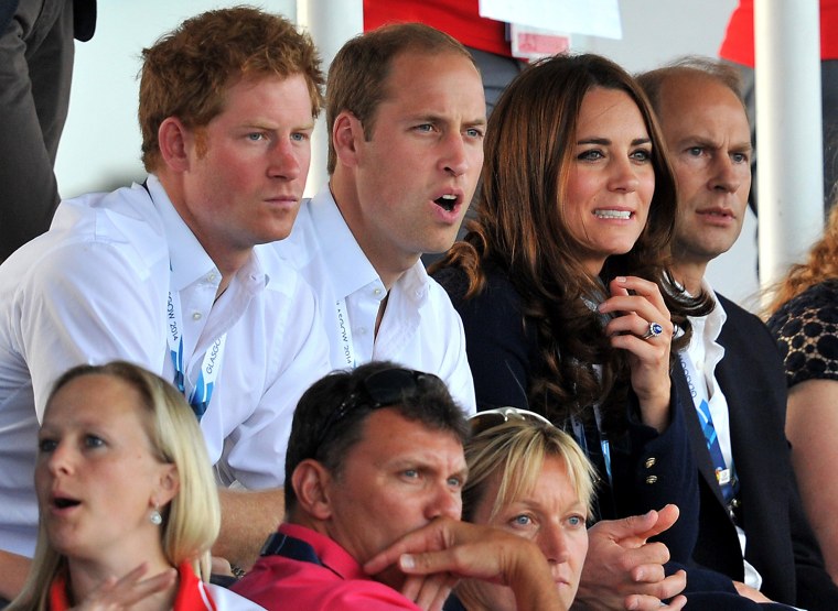 Prince Harry, Prince William and Duchess Catherine react as they watch the women's field hockey match between Wales and Scotland.