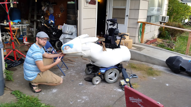 Ryan Weimer assembles a Halloween costume for his son, Keaton, who has muscular dystrophy.