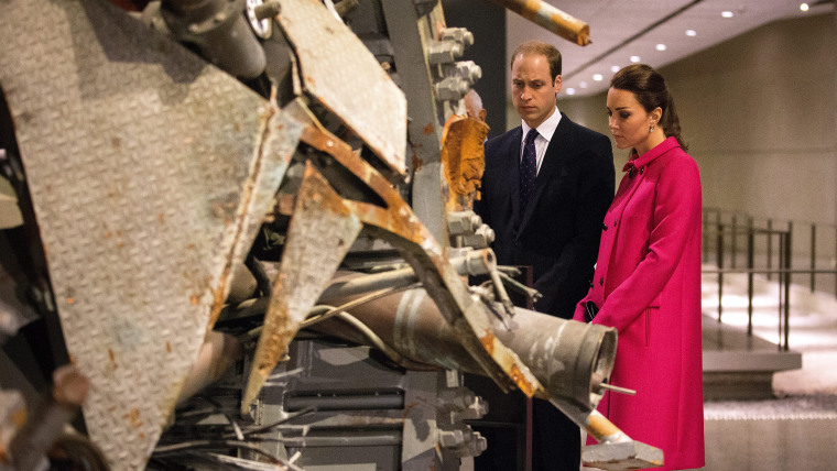 Prince William and Catherine look at a portion of the North Tower antenna during a tour of the National 9/11 Memorial & Museum.