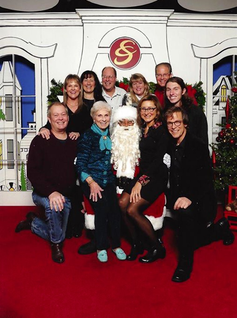 The 2014 photo marks the 60th straight year that the Wilson family has posed for photos with Santa.