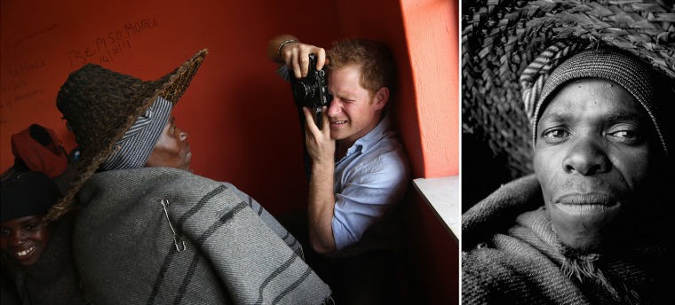 MOKHOTLONG, LESOTHO - DECEMBER 08:  Prince Harry takes a photograph on a Fuji X100s Camera during a visit to a herd boy night school constructed by Se...