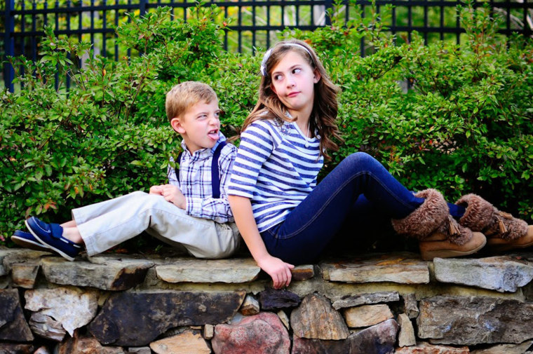 Aiden and his big sister, 10-year-old Caroline, share a light moment.