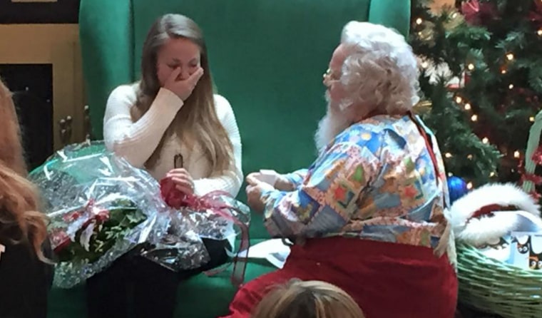 A Santa Claus at Indiana's Eastland Mall assists soldier in Afghanistan and proposes to his girlfriend. Photo: Eastland Mall via Facebook.