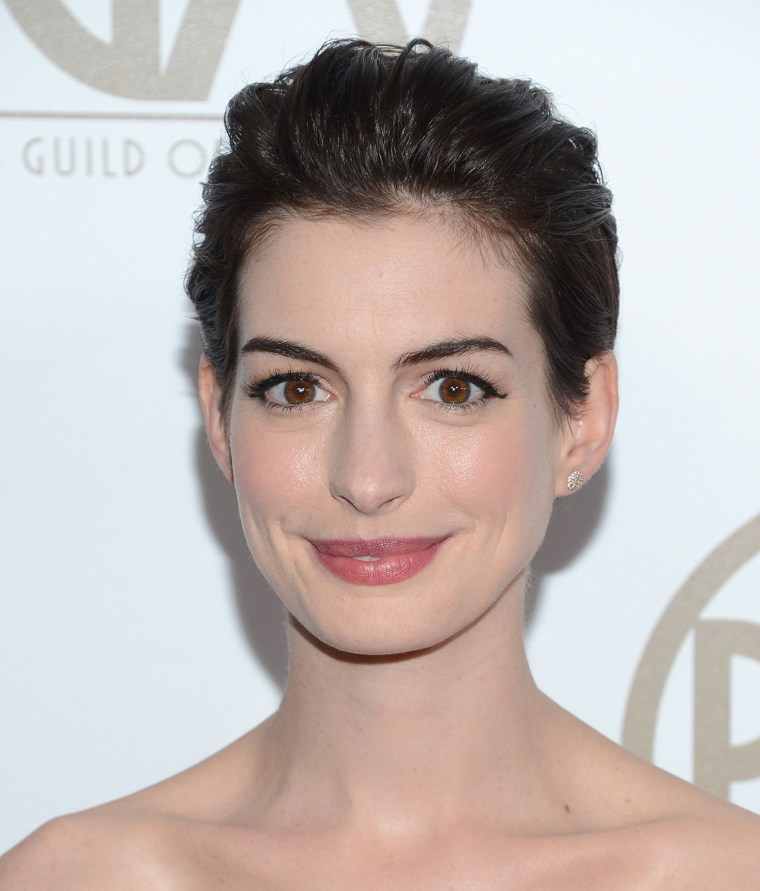 Actress Anne Hathaway shows off her slicked back 'do.