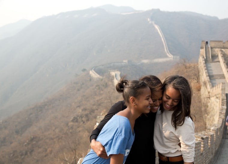 \"March 23, 2014
\"A great moment captured by Amanda Lucidon of the First Lady and daughters Sasha and Malia during their visit to the Great Wall of Chi...