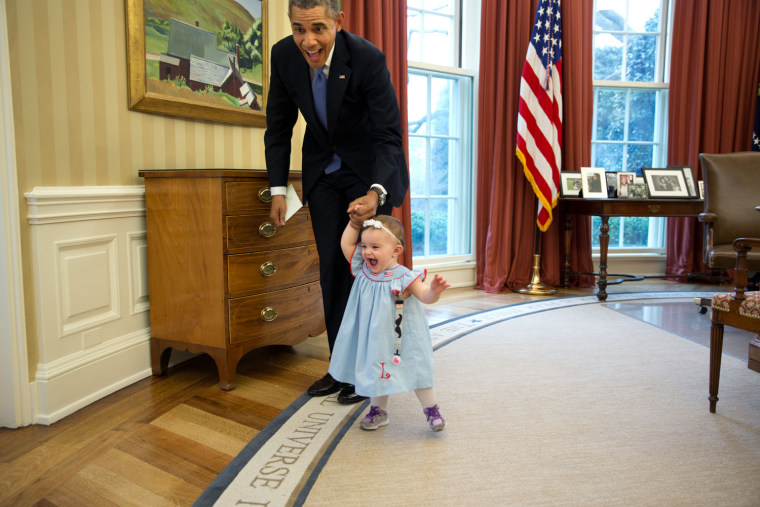 April 4, 2014
\"Despite the haphazard framing, I love the expressions on the President and one-year-old Lincoln Rose Smith as she learns to walk in the...