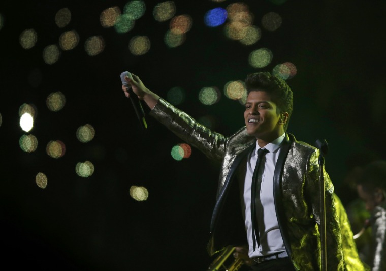 Bruno Mars performs during the halftime show of the NFL Super Bowl XLVIII football game between the Denver Broncos and the Seattle Seahawks in East Ru...