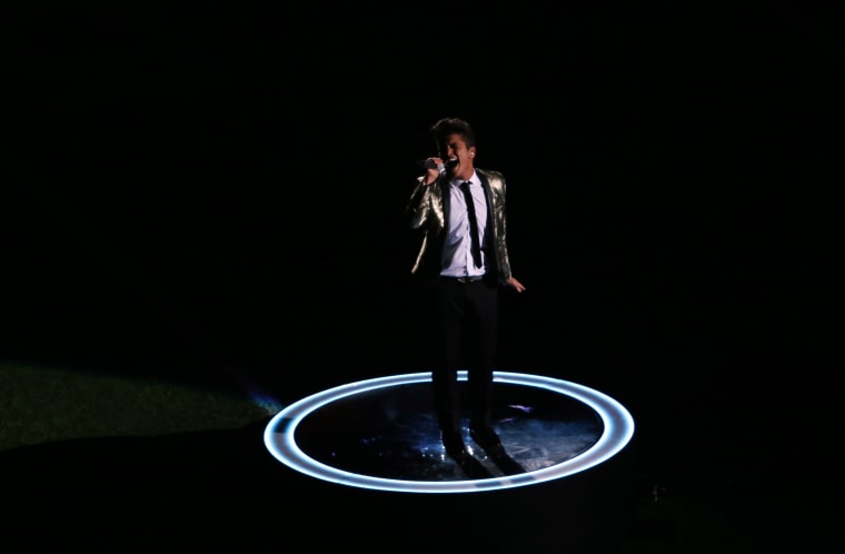 Bruno Mars worked up a sweat as he worked through his hits during the Super Bowl halftime show.