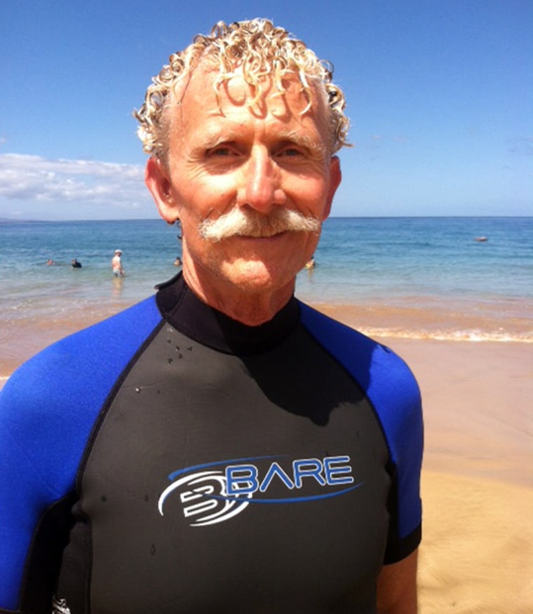 Rick Moore poses on the island of Maui, Hawaii, on Aug. 15, a day after he jumped into the water to rescue a shark attack victim who lost her arm.