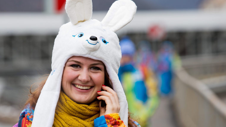 epa04049233 A volunteer wears a Olympic mascot Doe Hare hat in Krasnaya Polyana, at the Sochi 2014 Olympic Games, Sochi, Russia, 31 January 2014  EPA/...