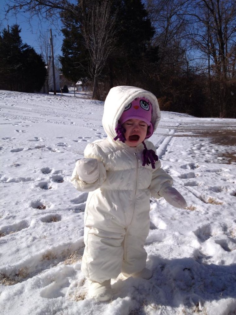 Facebook fan shares a pic of her unhappy child in the snow.
