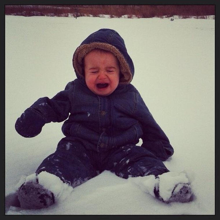 Facebook fan shares a pic of her child tired of the snow.