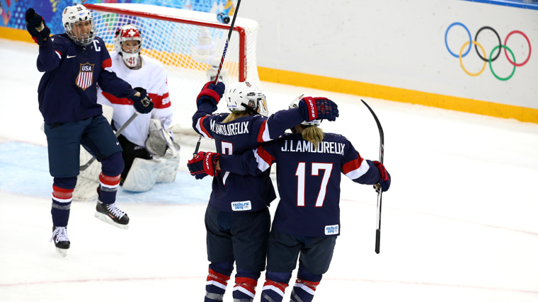 SOCHI, RUSSIA - FEBRUARY 10:  Monique Lamoureux #7 of United States celebrates with team-mate Jocelyne Lamoureux #17 of United States after scoring he...