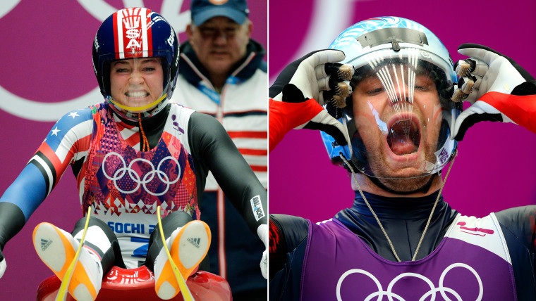 Two luge competitors make funny faces on the slopes
