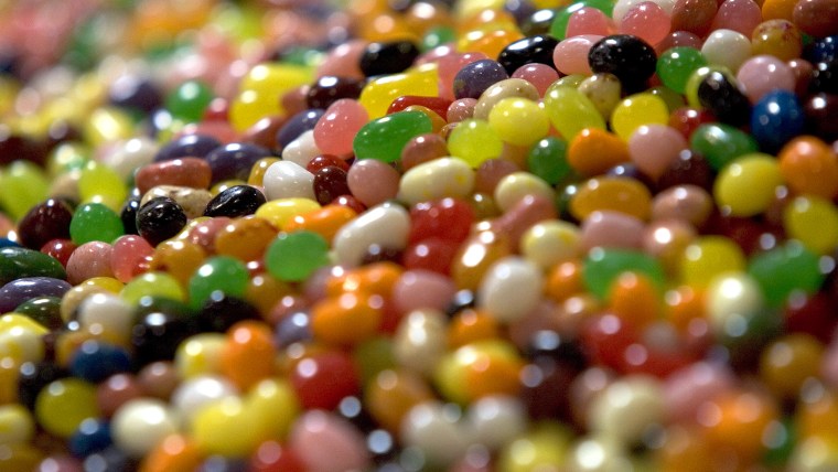 Jelly beans sit in a bin waiting to be packaged on the assembly line at the Jelly Belly factory.