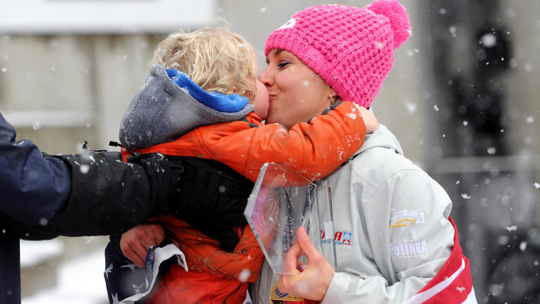 Pikus-Pace kisses her son Traycen after winning the women's Skeleton World Cup in Koenigssee near Berchtesgaden, Germany, on January 24.