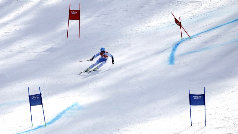 Austria's Matthias Mayer speeds down the course during the second run of the men's alpine skiing giant slalom event at the 2014 Sochi Winter Olympics ...