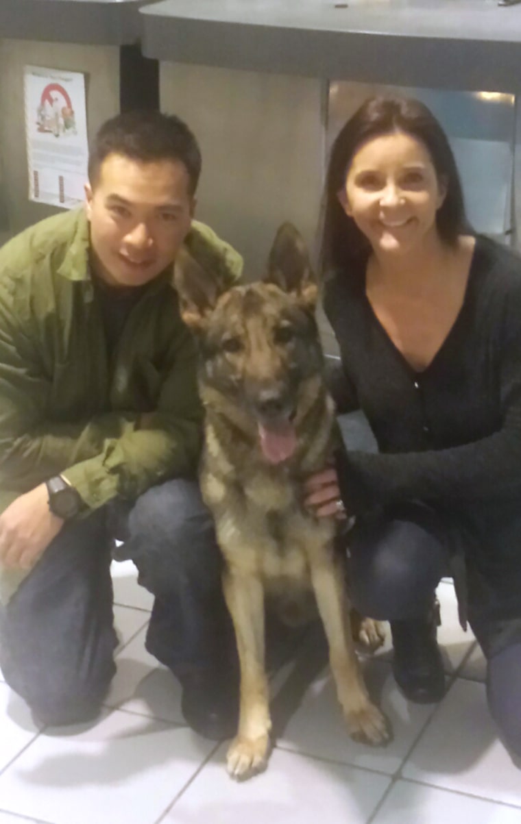 Sgt. Calvin Aguilar, Kristen Maurer and Nico the dog