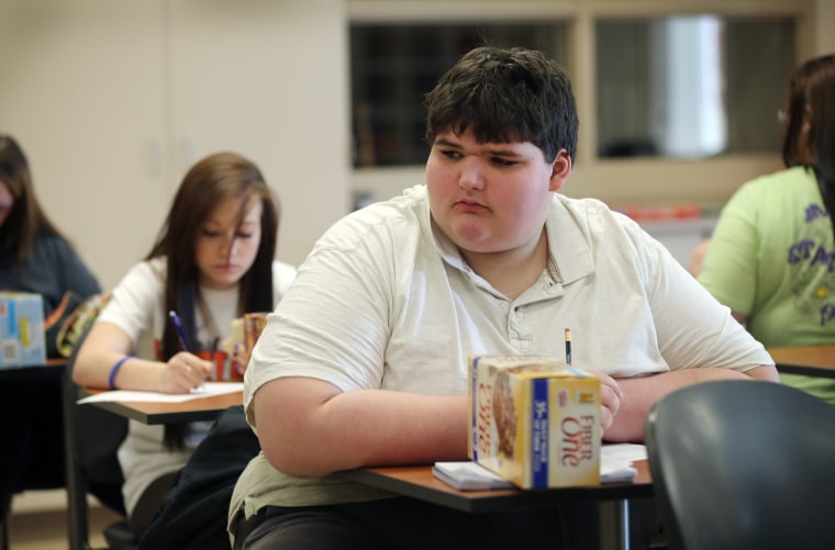 Eric Ekis, a freshman at Franklin High School in Franklin IN, started high school weighing in at around 500 lbs. Thanks to the help of teachers Don We...