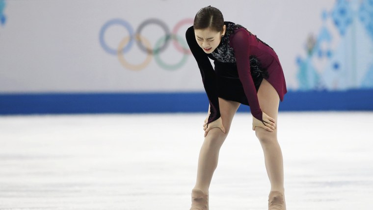 Korea's Yuna Kim reacts at the end of her program during the Figure Skating Women's free skating Program at the Sochi 2014 Winter Olympics, February 2...