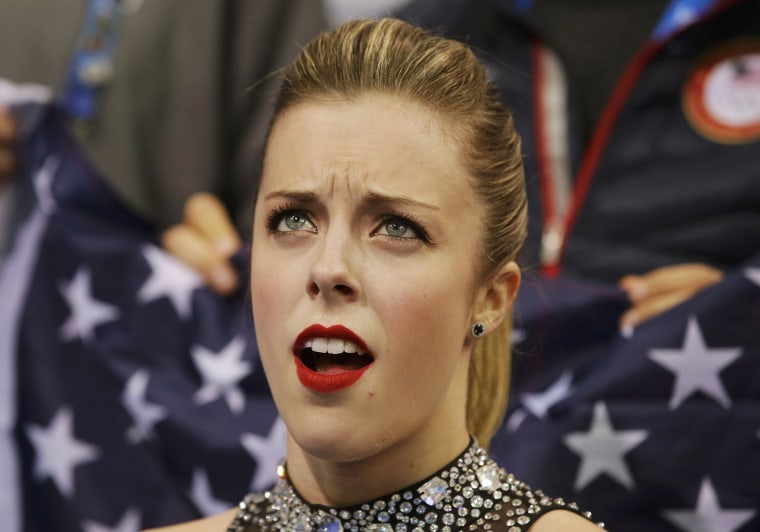 Ashley Wagner of the United States reacts in the \"kiss and cry\" area during the Team Ladies Short Program at the Sochi 2014 Winter Olympics, February ...