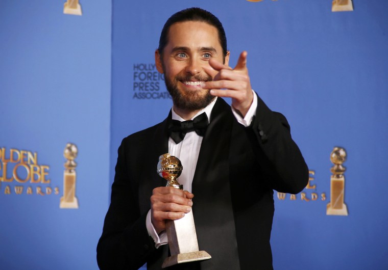 Jared Leto poses backstage with his award for Best Supporting Actor in a Motion Picture for his role in \"The Dallas Buyers Club\" at the 71st annual Go...